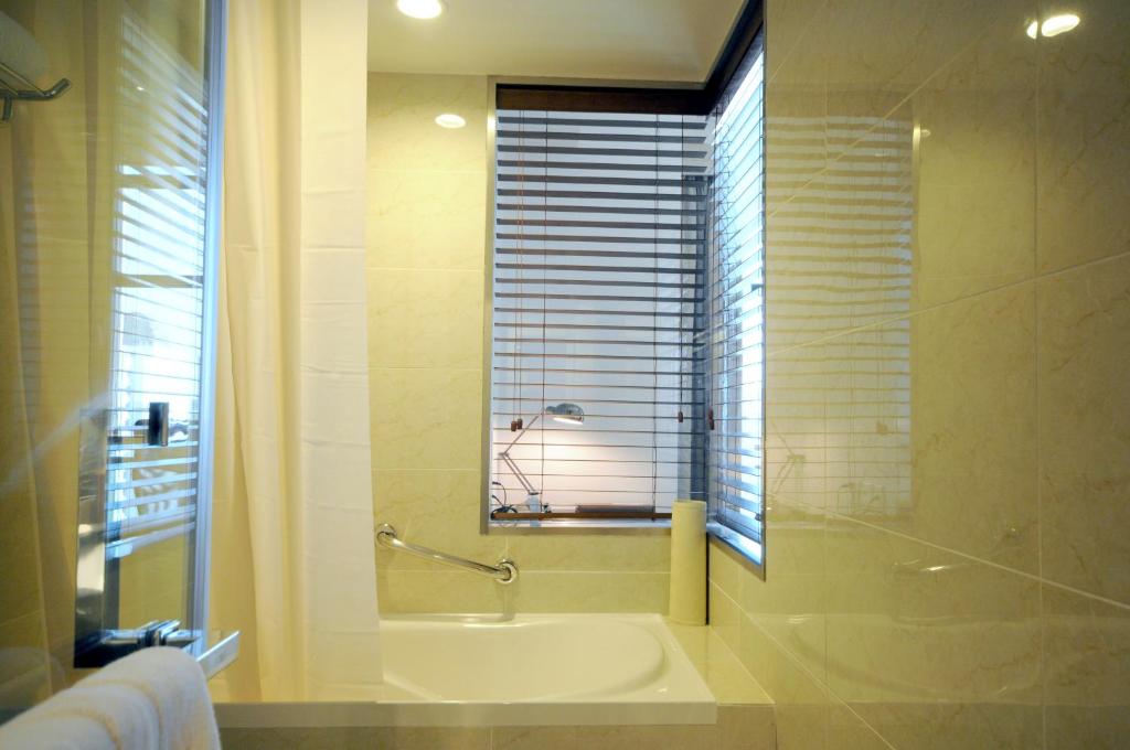 Koupelna v ubytování Gubei Garden Hotel Shanghai Hongqiao