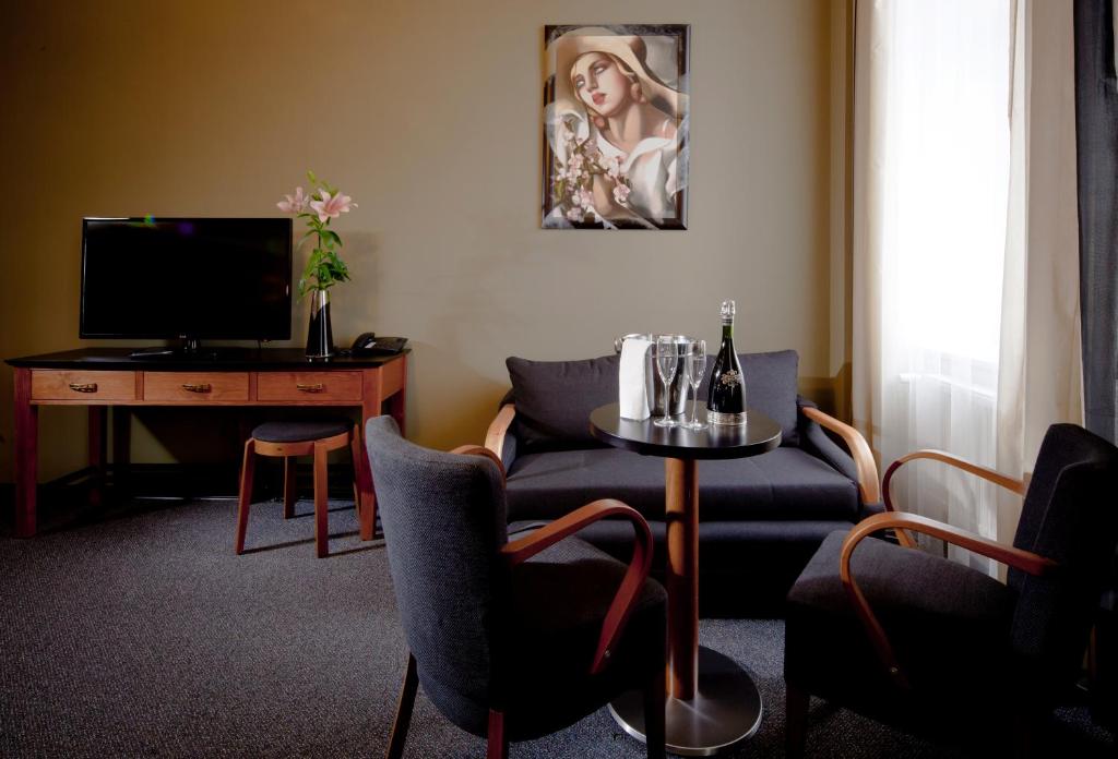 TV a/nebo společenská místnost v ubytování Hotel Havel