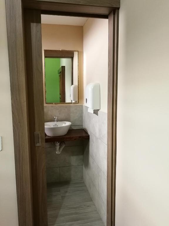 Koupelna v ubytování Chapelet Hostal