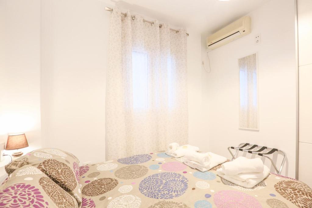 Postel nebo postele na pokoji v ubytování Apartamento Sol