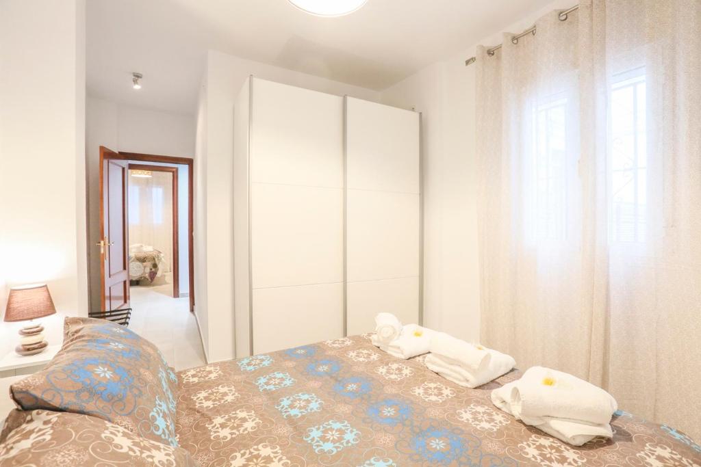 Postel nebo postele na pokoji v ubytování Apartamento Sol