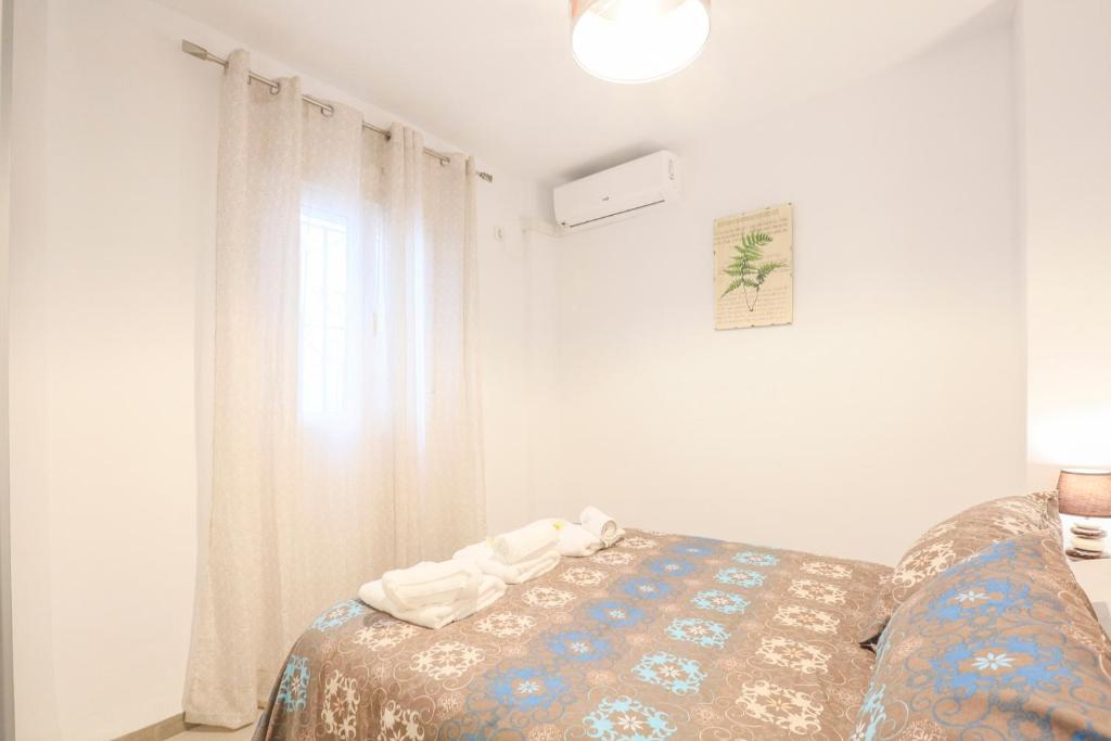 Postel nebo postele na pokoji v ubytování Apartamento Sol