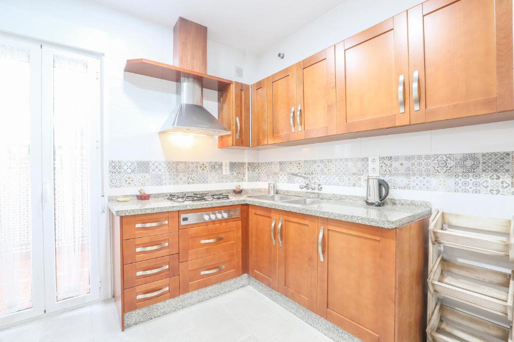 Kuchyň nebo kuchyňský kout v ubytování Apartamento Sol