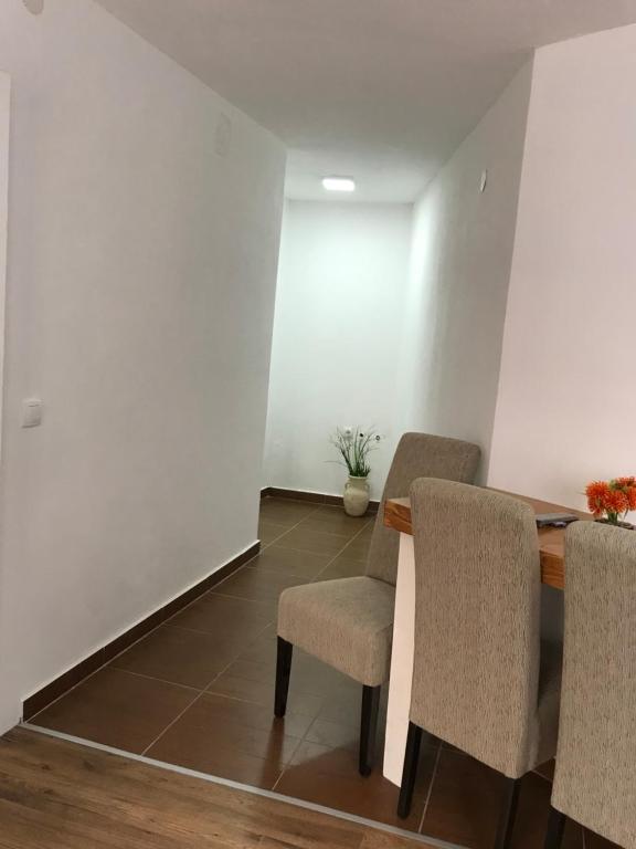 A seating area at Apartments Kollari