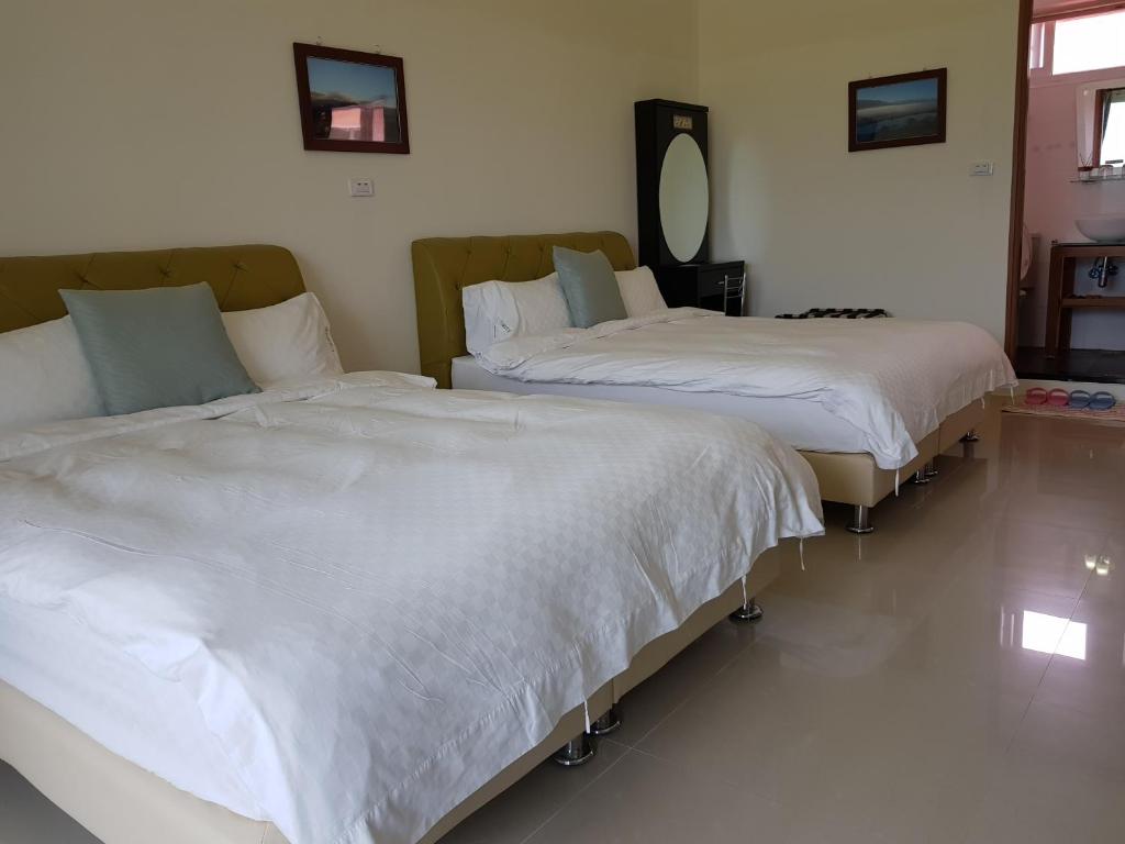 Postel nebo postele na pokoji v ubytování 7 Milefog B&B