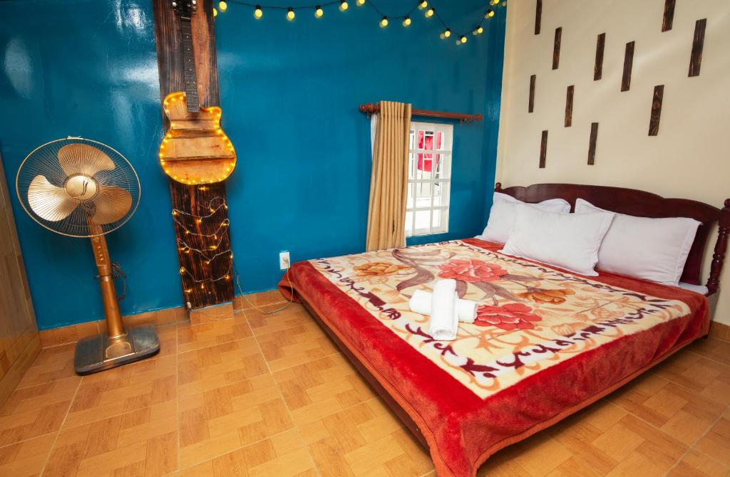 Postel nebo postele na pokoji v ubytování Bình Đào Hotel - Khách sạn ngay trung tâm giá rẻ