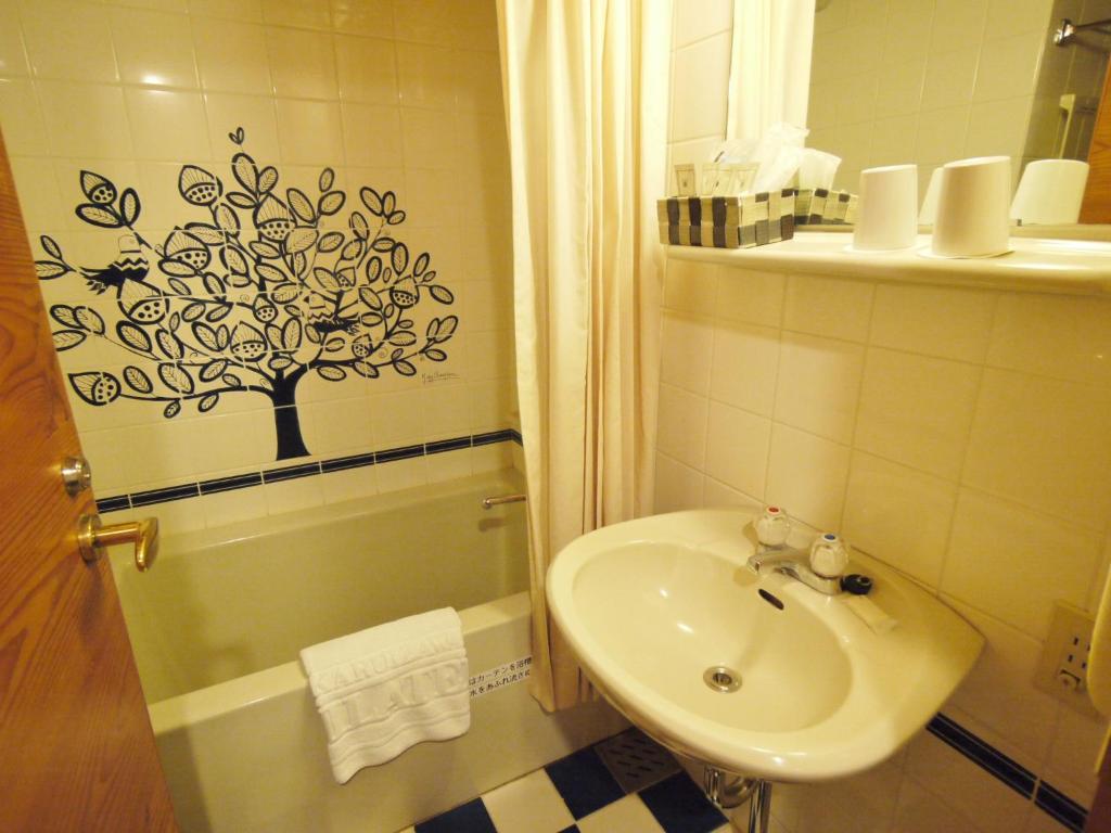 Koupelna v ubytování Kyu-Karuizawa Hotel Shinonome