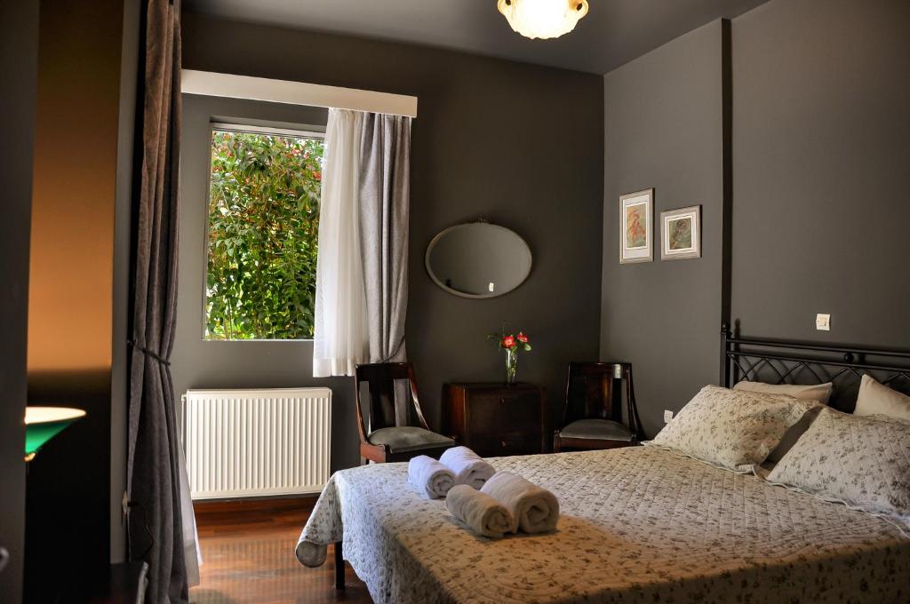 Cama o camas de una habitación en Kifissia Naxou Maisonette