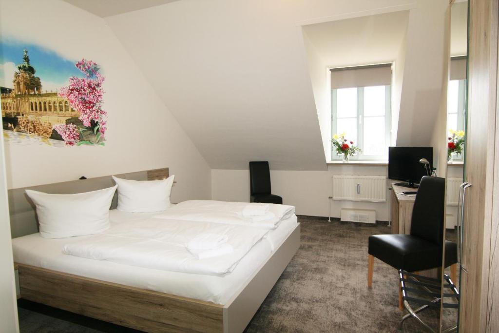 Postel nebo postele na pokoji v ubytování Hotel am Waldschlösschen - Brauhaus
