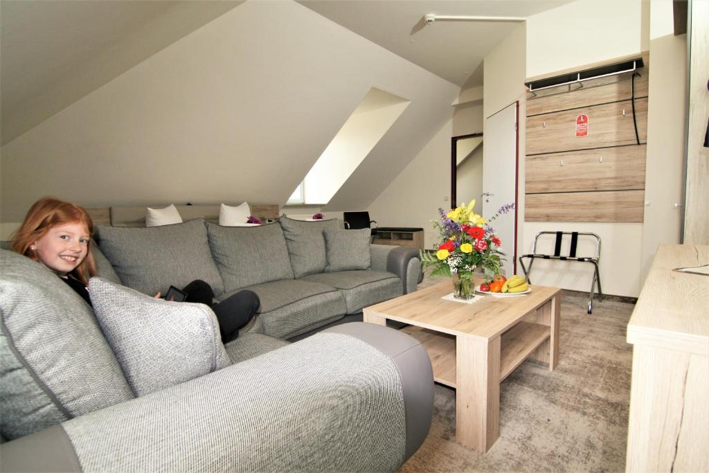Posezení v ubytování Hotel am Waldschlösschen - Brauhaus
