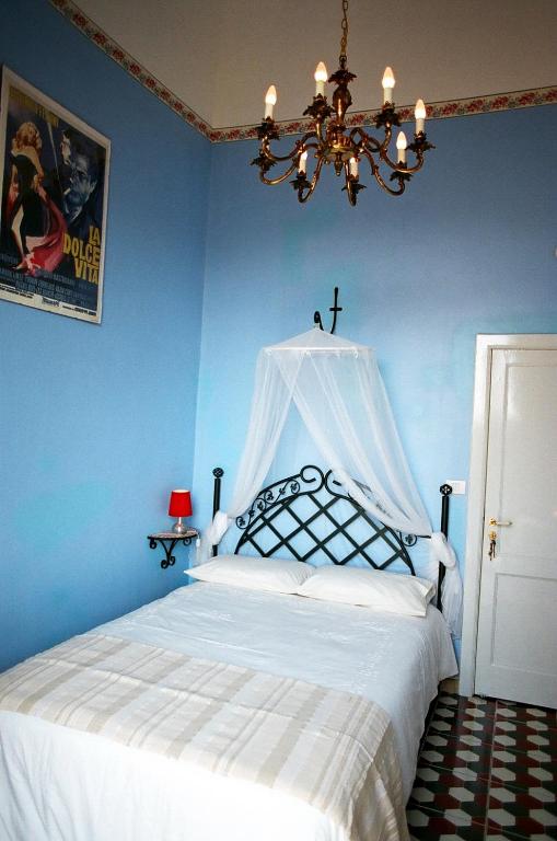 Posteľ alebo postele v izbe v ubytovaní 5 Balconi B&B