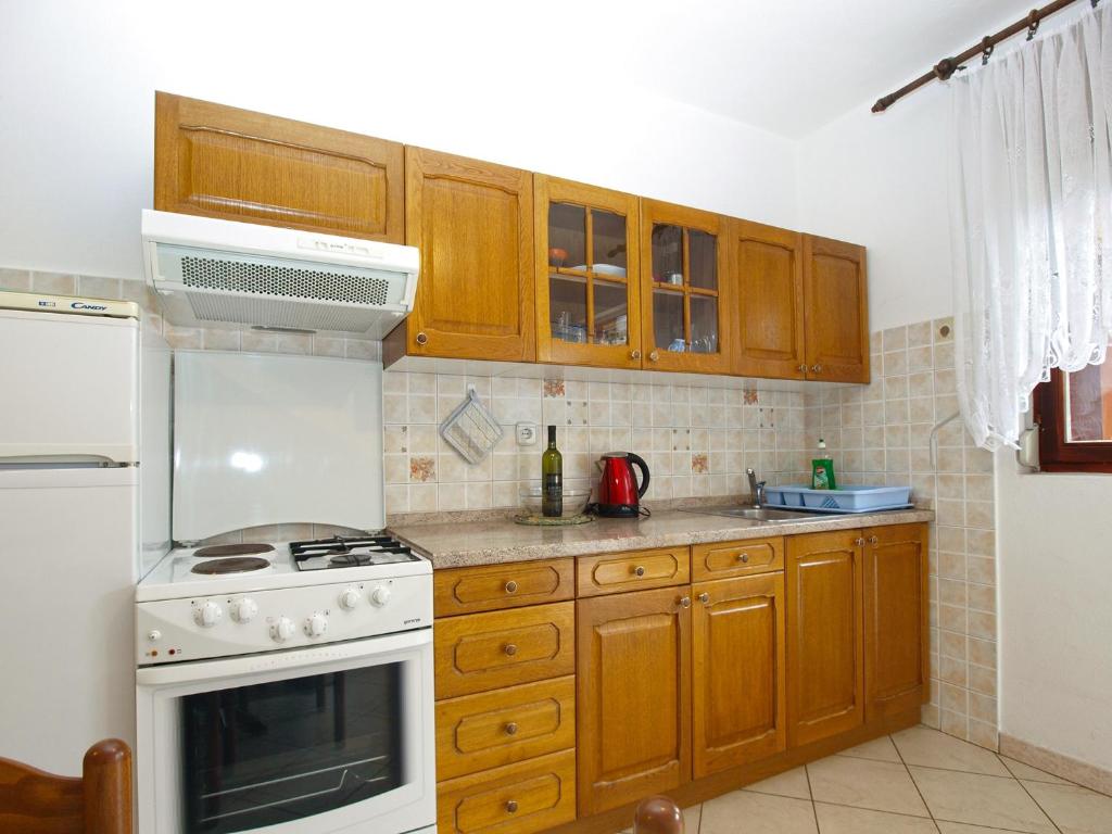 Kuchyň nebo kuchyňský kout v ubytování Apartments Miranda 1858