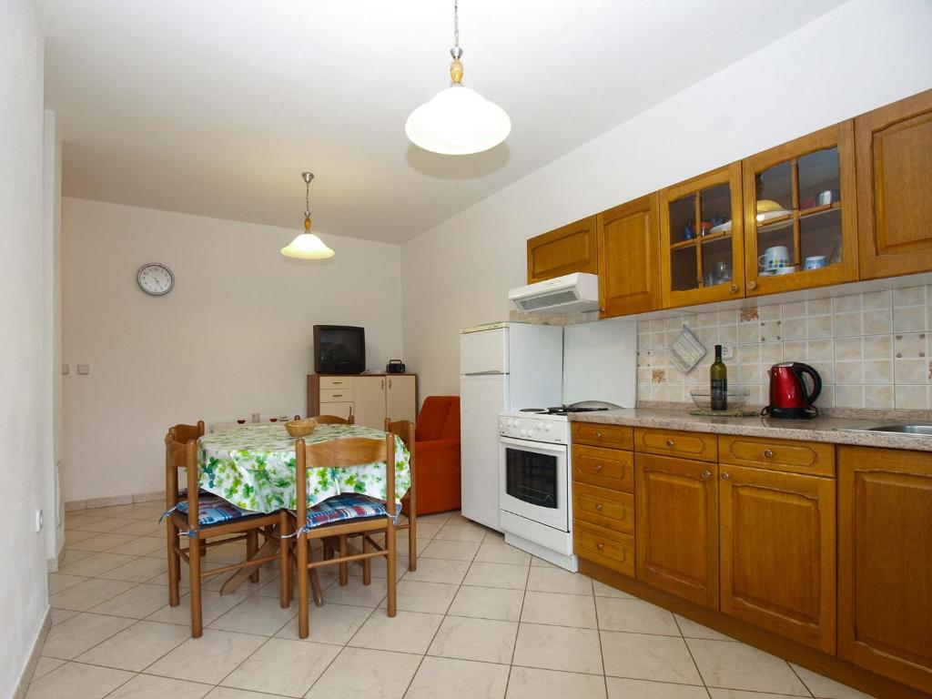 Kuchyň nebo kuchyňský kout v ubytování Apartments Miranda 1858