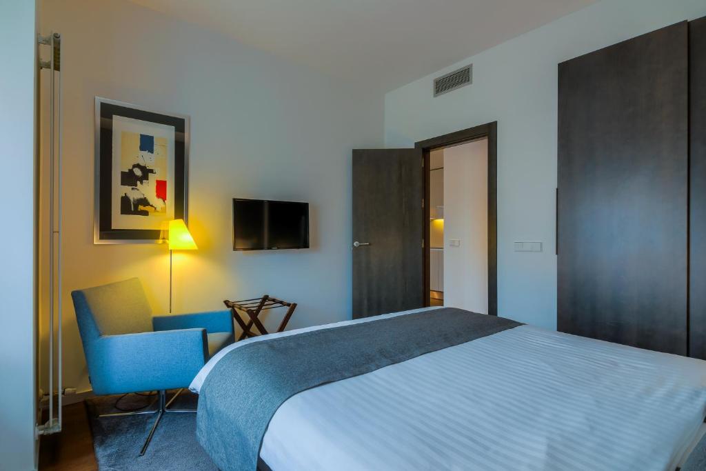 Postel nebo postele na pokoji v ubytování Hotel Cismigiu