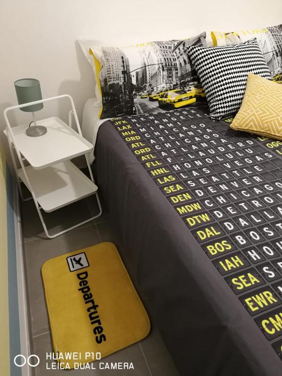 Łóżko lub łóżka w pokoju w obiekcie Annetta home