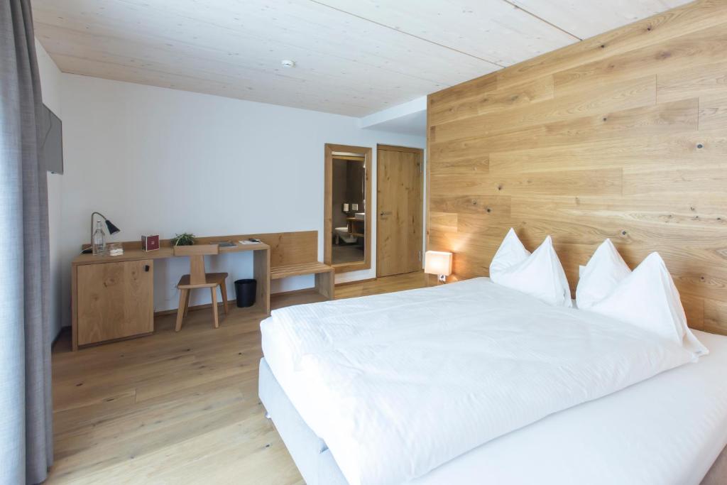 Postel nebo postele na pokoji v ubytování Hotel Reuti