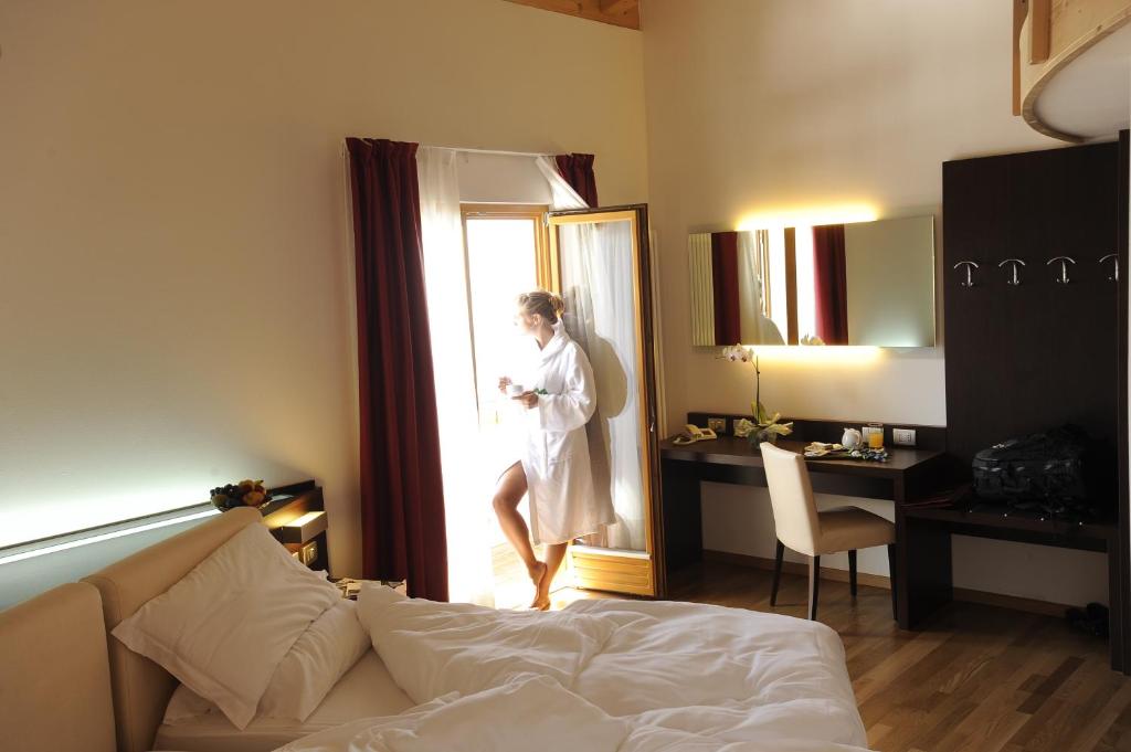 Postel nebo postele na pokoji v ubytování Hotel Montana