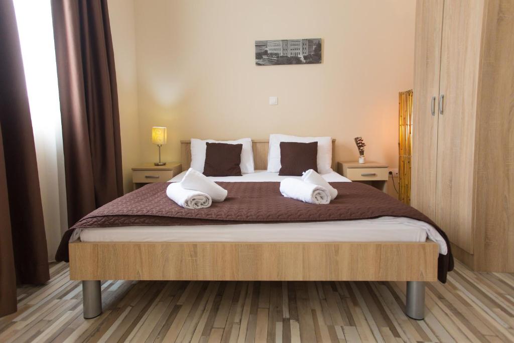 Postel nebo postele na pokoji v ubytování Hotel Hana