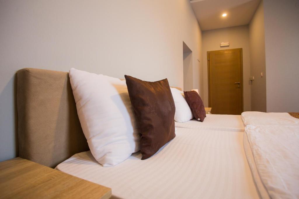 Postel nebo postele na pokoji v ubytování Hotel Hana