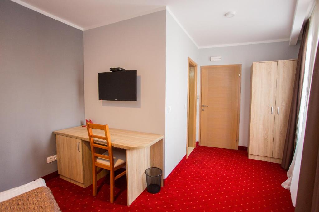 TV a/nebo společenská místnost v ubytování Hotel Hana