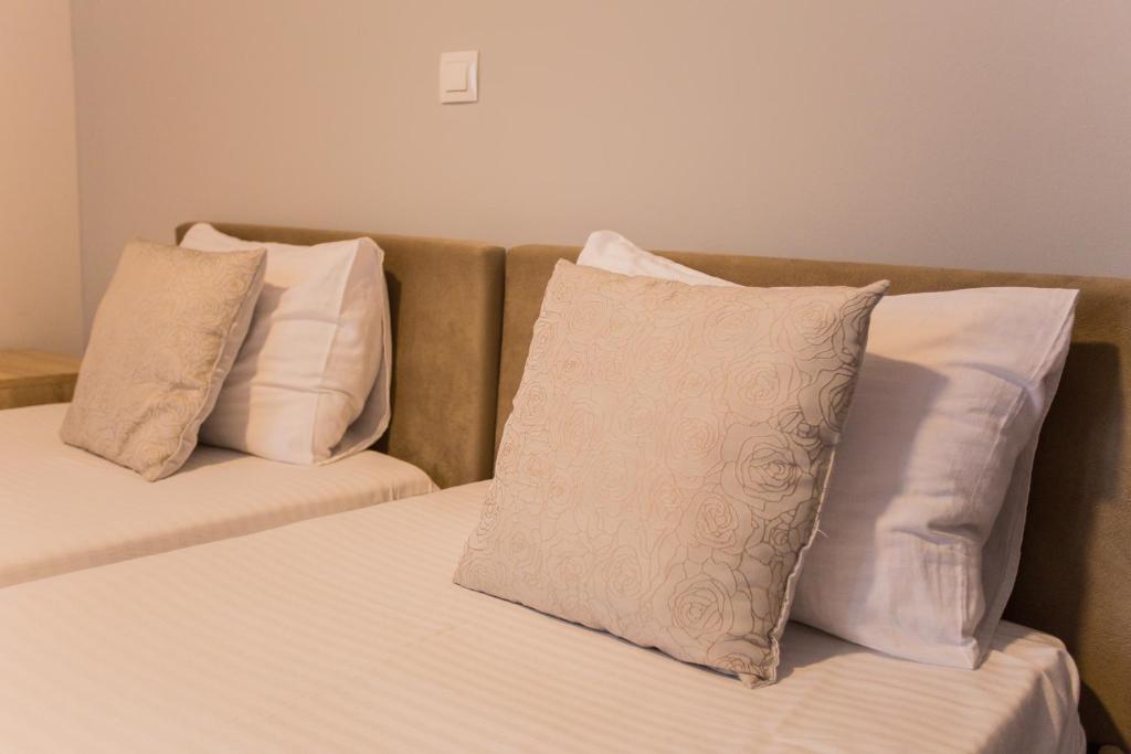 Postel nebo postele na pokoji v ubytování Hotel Hana