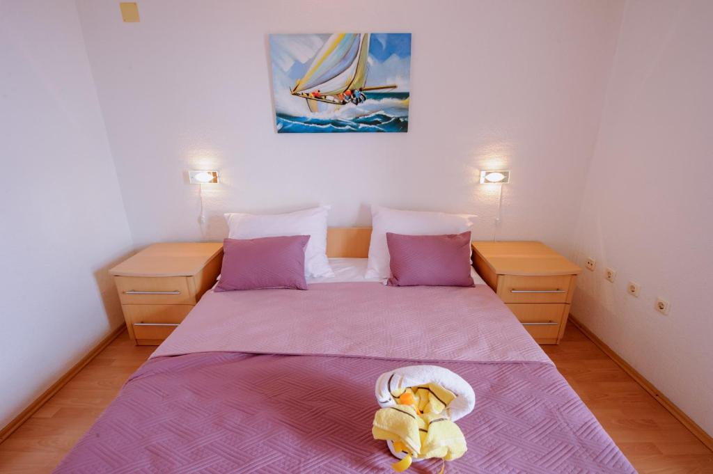 Postel nebo postele na pokoji v ubytování Pension Maric Rooms