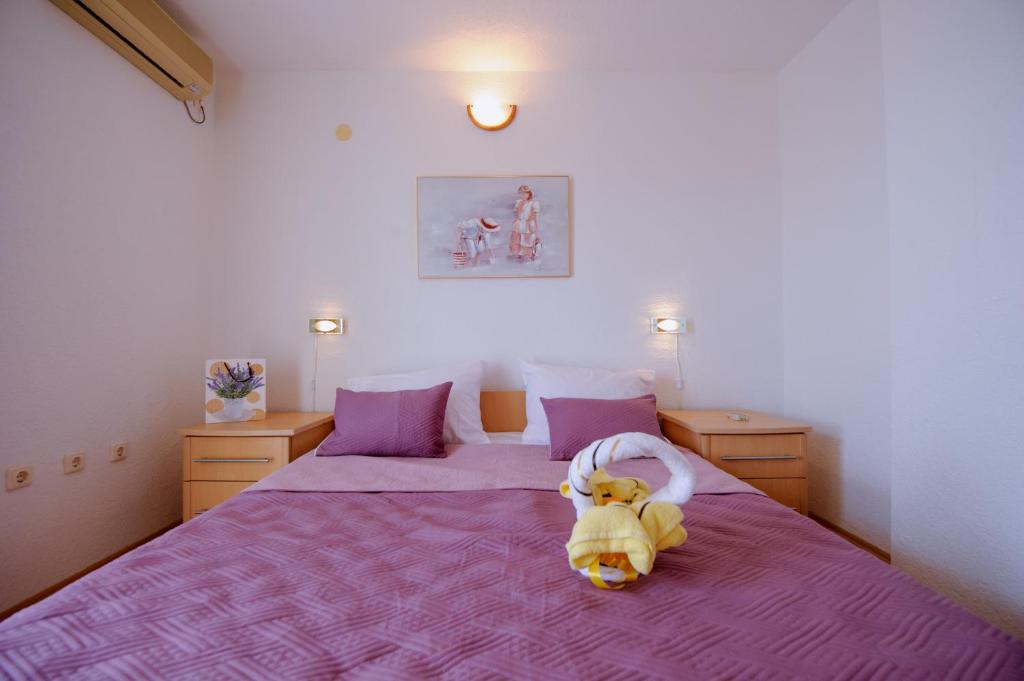 Postel nebo postele na pokoji v ubytování Pension Maric Rooms