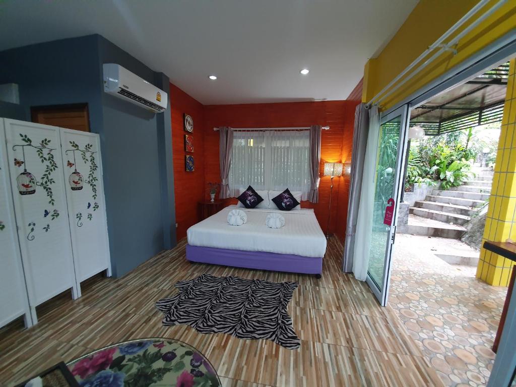 Postel nebo postele na pokoji v ubytování Greenery Resort Koh Tao