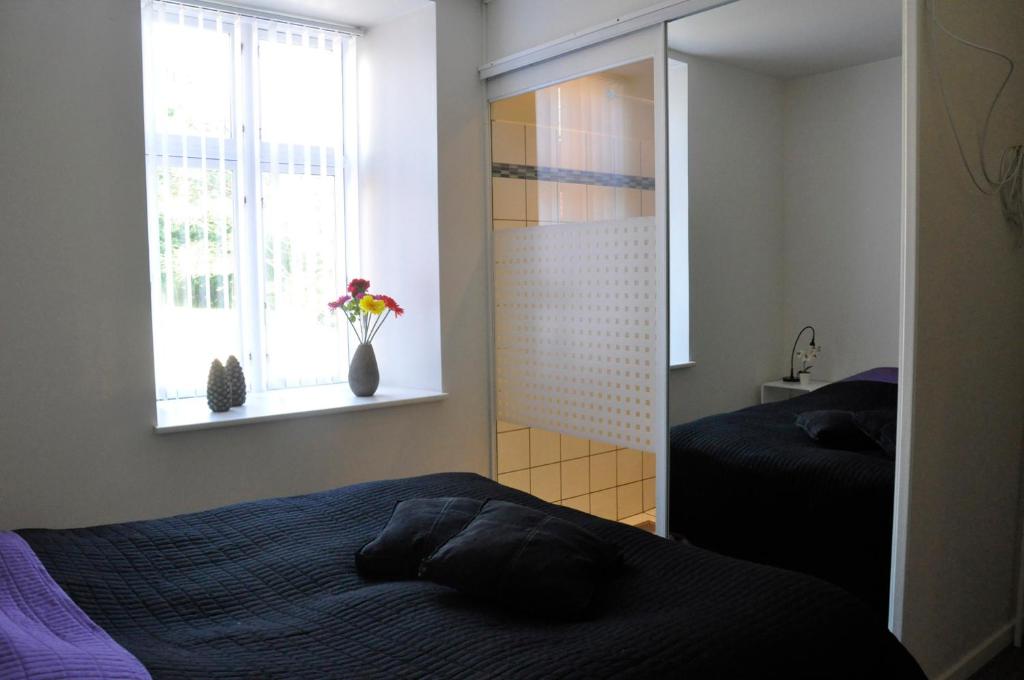 Postel nebo postele na pokoji v ubytování AB Centrum Aarhus Bed without Breakfast