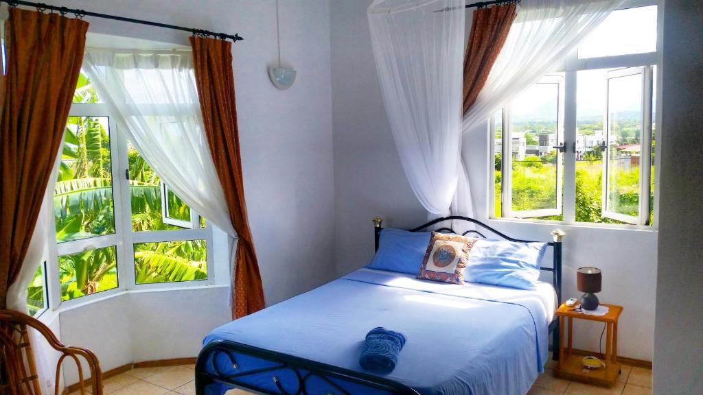 Postel nebo postele na pokoji v ubytování Surf House