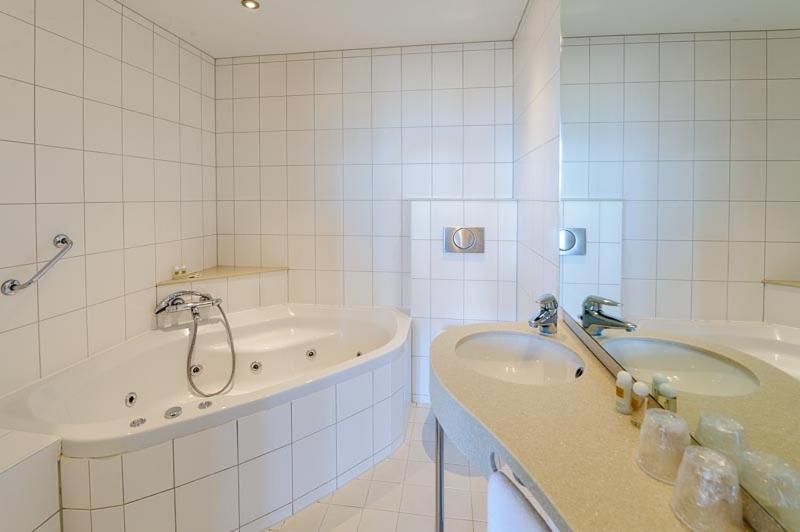 Koupelna v ubytování Boulevard Hotel Scheveningen