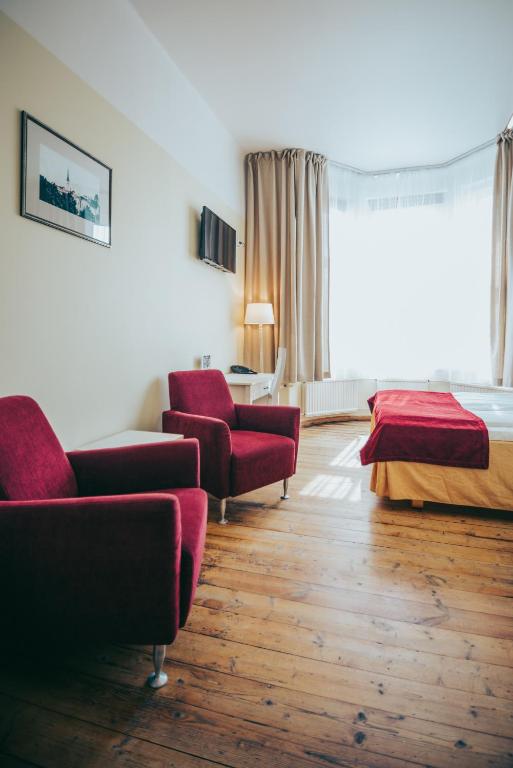 Posezení v ubytování Economy Hotel