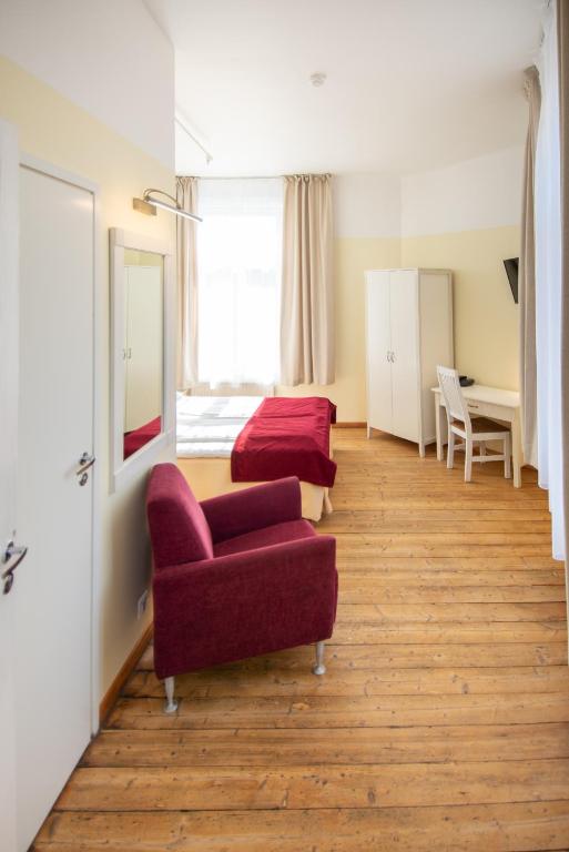 Posezení v ubytování Economy Hotel