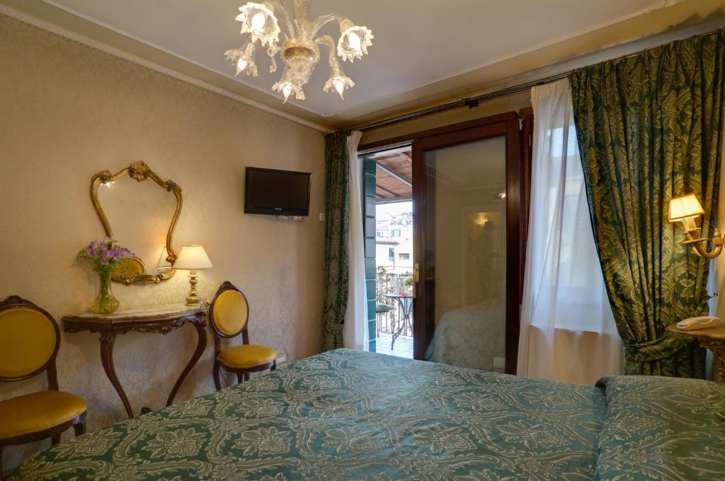 Hotel Bel Sito e Berlinoにあるベッド