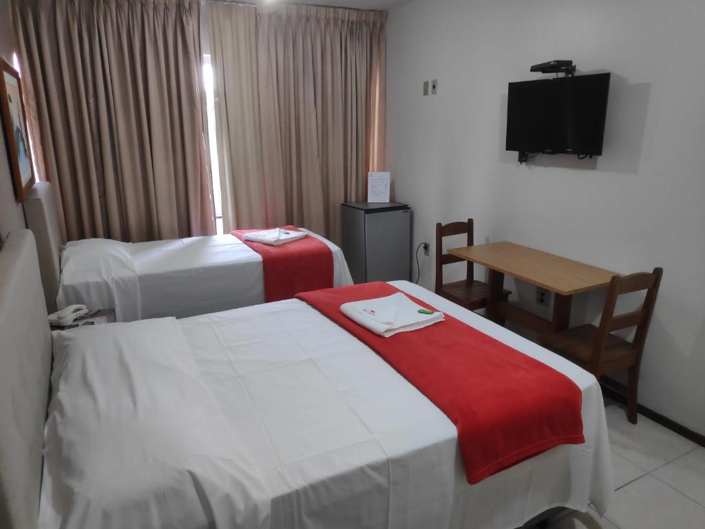 Postel nebo postele na pokoji v ubytování Max Hotel