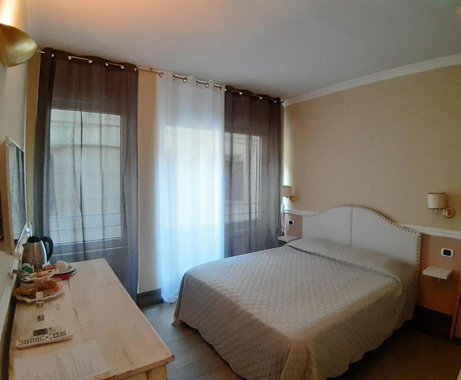 Postel nebo postele na pokoji v ubytování Bed Bra