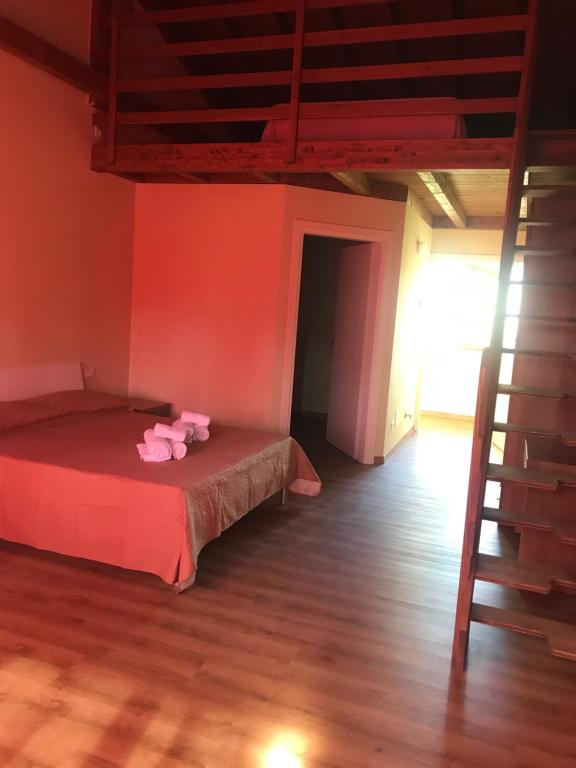 Postel nebo postele na pokoji v ubytování Agriturismo Mulino Bianco