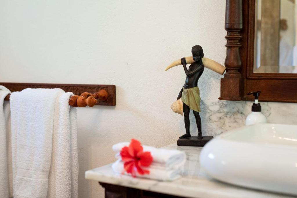 Postel nebo postele na pokoji v ubytování Tikitam Palms Boutique Hotel