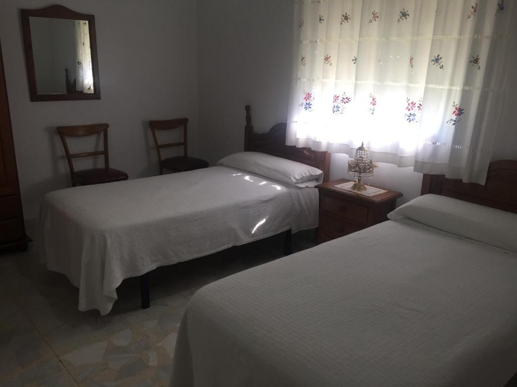 Postel nebo postele na pokoji v ubytování Casa rural Las Erillas
