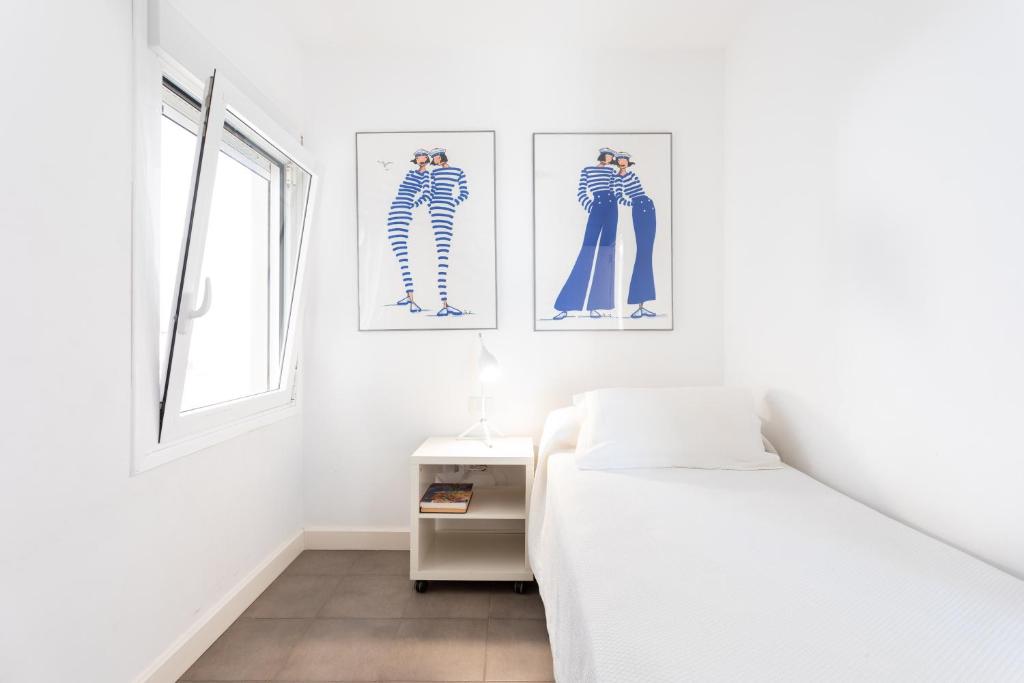 Posteľ alebo postele v izbe v ubytovaní PillowAbroad - Poris Vista Mar