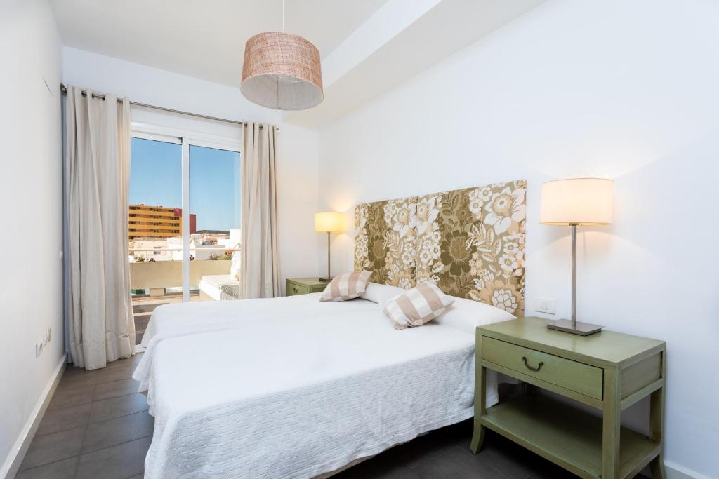 Posteľ alebo postele v izbe v ubytovaní PillowAbroad - Poris Vista Mar
