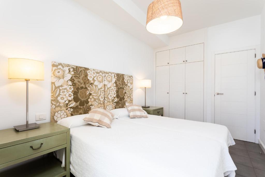 Posteľ alebo postele v izbe v ubytovaní PillowAbroad - Poris Vista Mar