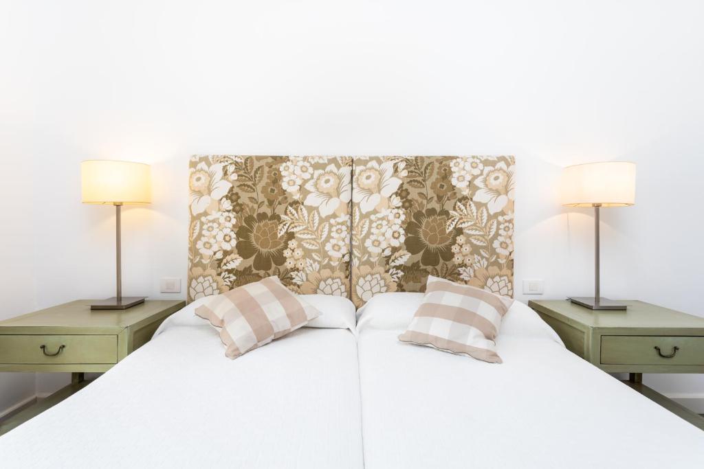 Posteľ alebo postele v izbe v ubytovaní PillowAbroad - Poris Vista Mar