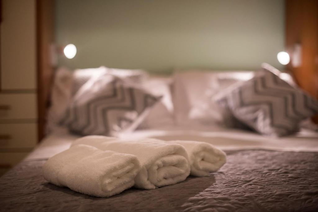 Posteľ alebo postele v izbe v ubytovaní Apartment Pax