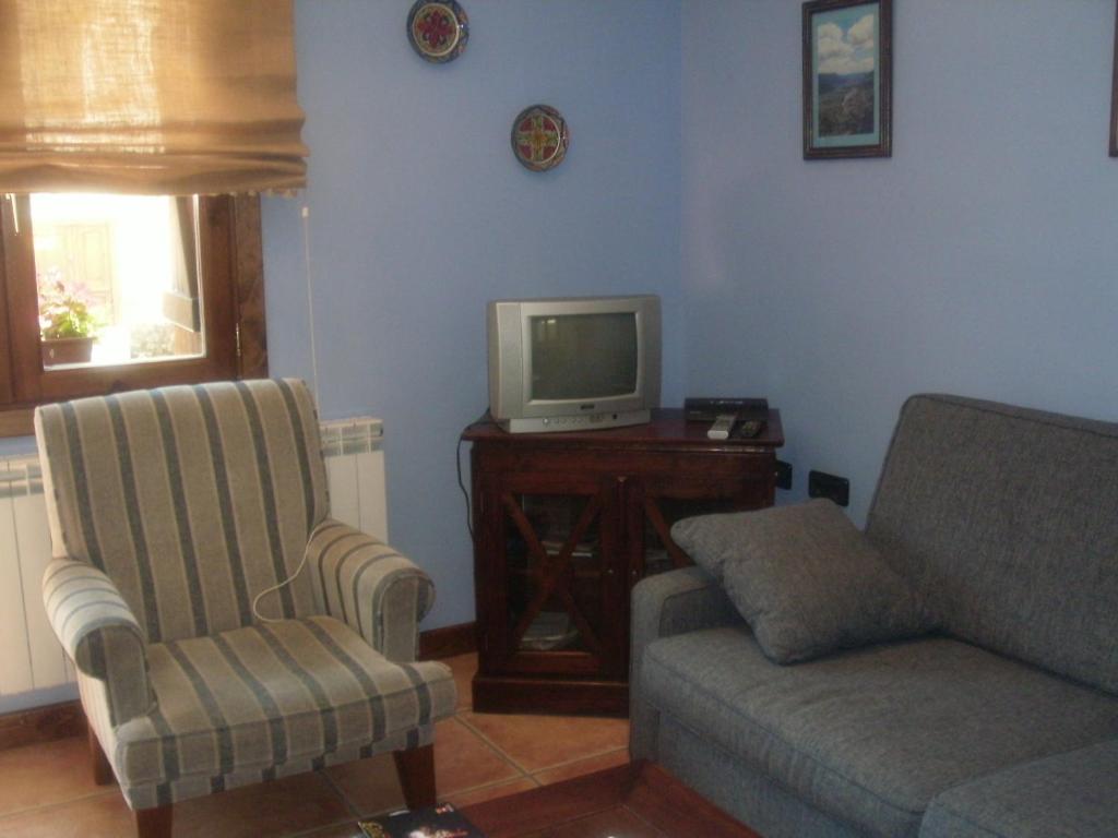 TV a/nebo společenská místnost v ubytování La Corralata