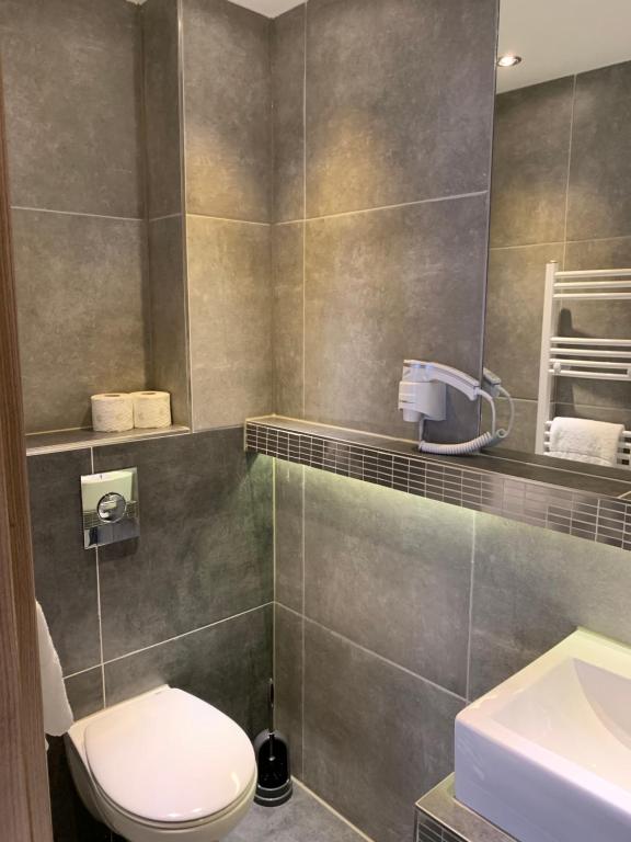 Koupelna v ubytování Hotel Dias