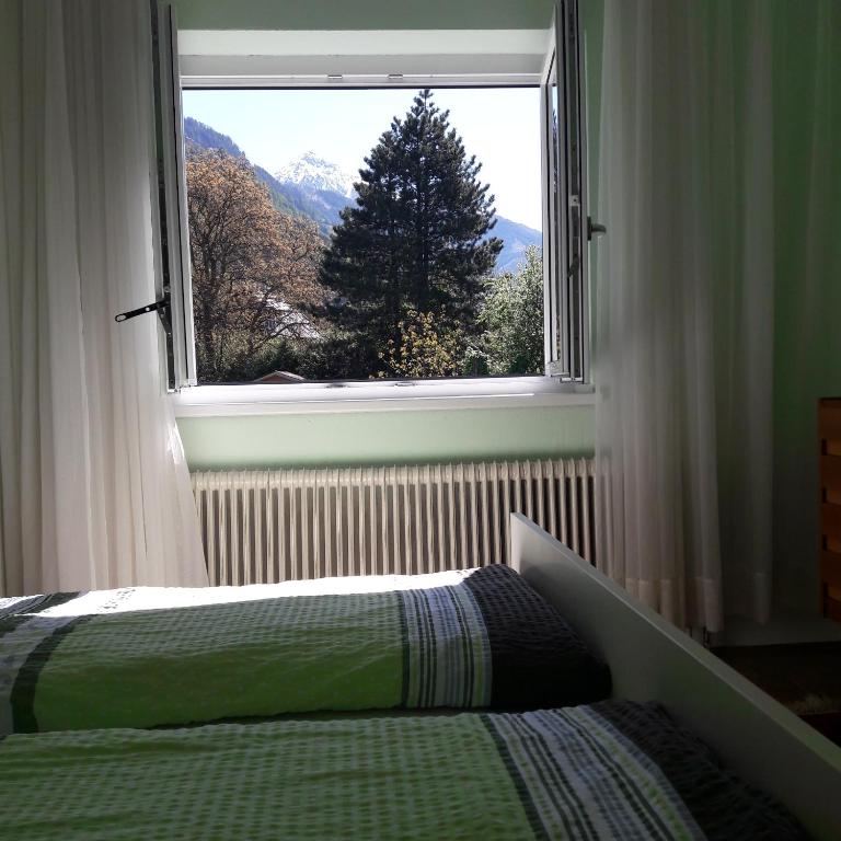 Postel nebo postele na pokoji v ubytování Villa Siebenruh