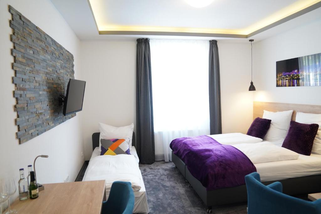 Postel nebo postele na pokoji v ubytování Hotel Dias