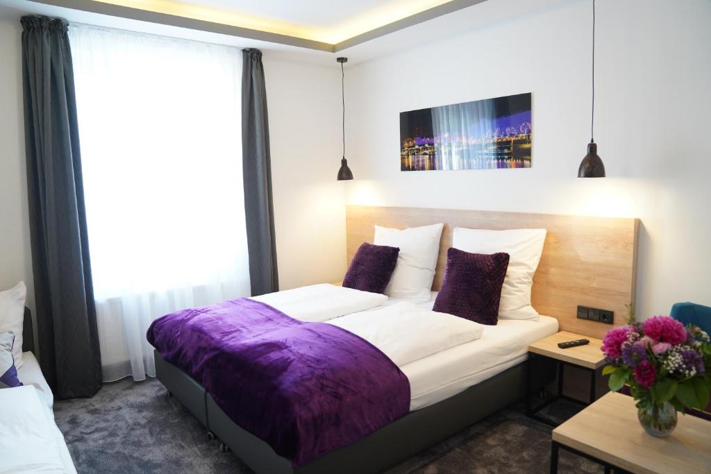 Postel nebo postele na pokoji v ubytování Hotel Dias