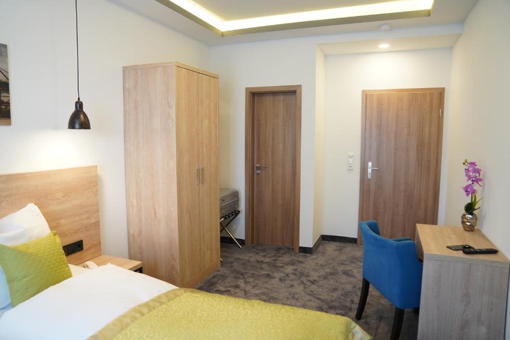 Postel nebo postele na pokoji v ubytování Hotel Dias